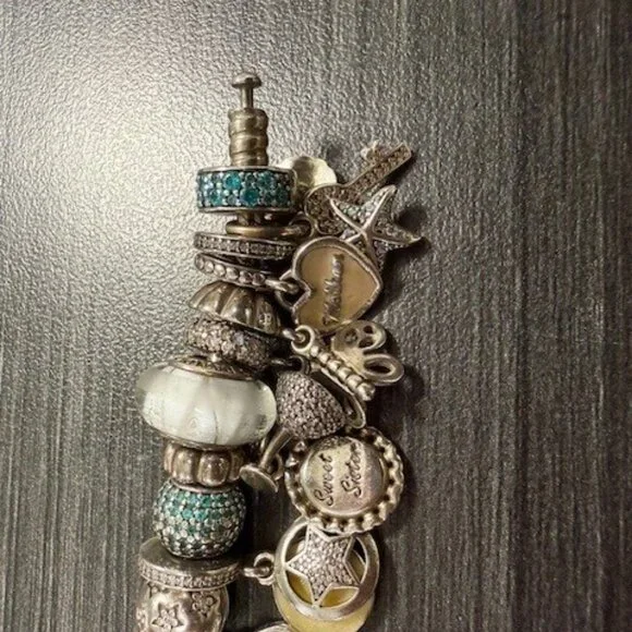 Authentic S925 Pandora Bracelet with 30 charms in excellent Preloved condition - Picture 8 of 9